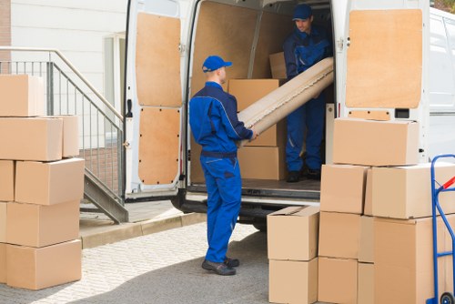 Moving van loading household furniture for a local move in Ireland