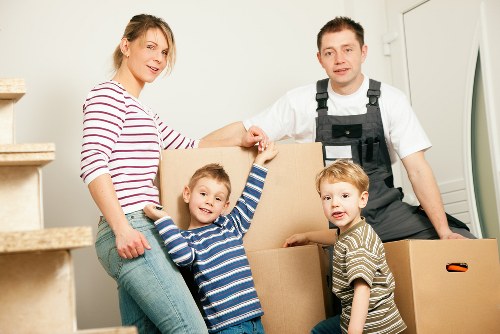 Boxes and furniture measured for a cubic-yard removal quote