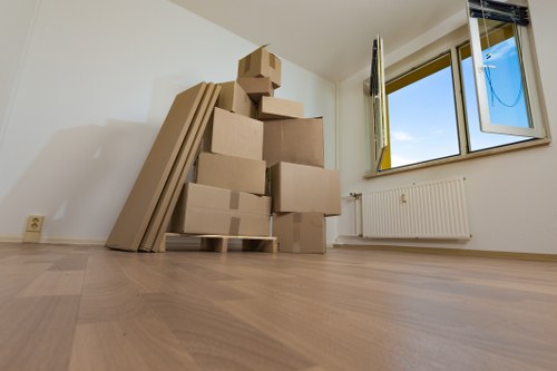 Packed moving boxes and furniture ready for transport in Ireland