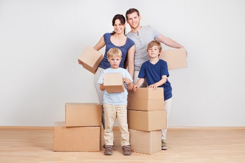 Local removals team handling a house move in an Irish neighborhood
