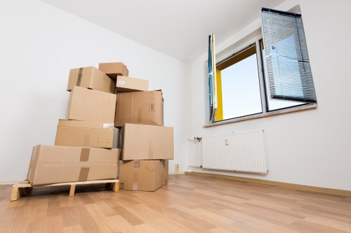Irish residential move with boxes and furniture being carried