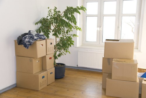 Packed boxes and protected furniture ready for moving day