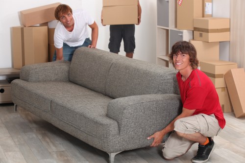 Removal team handling furniture in an Irish house move