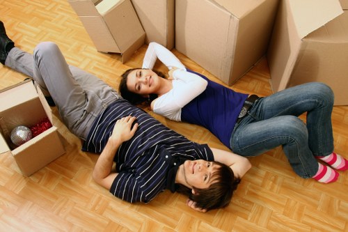 Boxes and household items ready for transport by moving truck